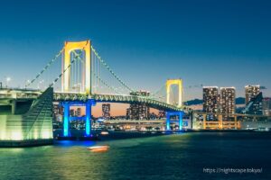 Rainbow Bridge illuminated by lights