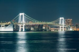 Illuminated Rainbow Bridge seen from Fujimi Bridge