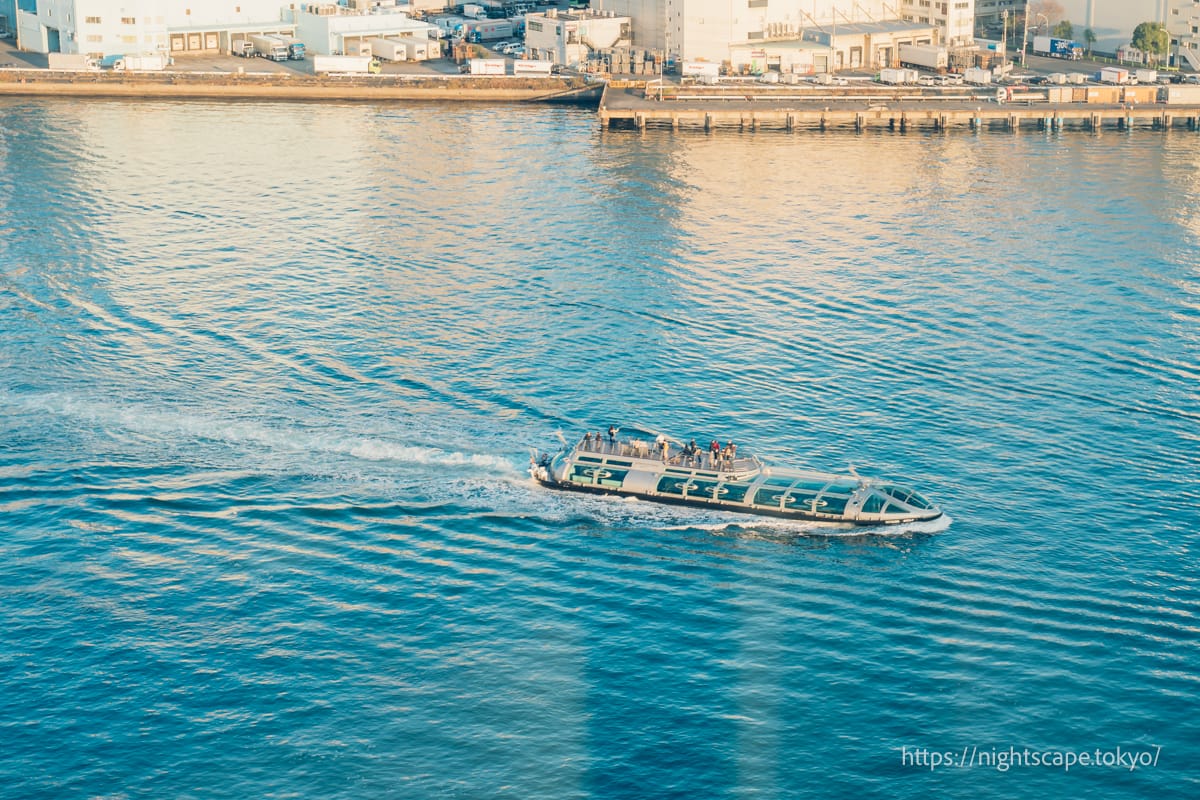 Pleasure boats plying the Sumida River.