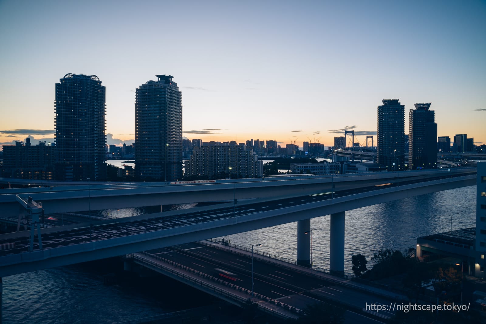 Odaiba area streetscape at dusk.