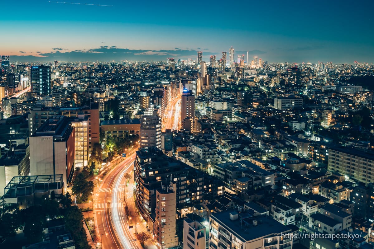 Night view towards Ikebukuro with Sunshine 60 and other buildings.