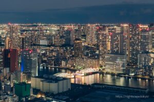 Illuminated Kachidoki Bridge and high-rise apartments in Harumi