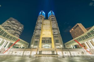 Tokyo Metropolitan Government Building illuminated in blue and yellow